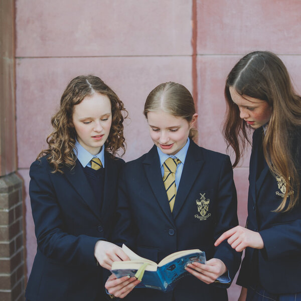Senior School pupils reading together